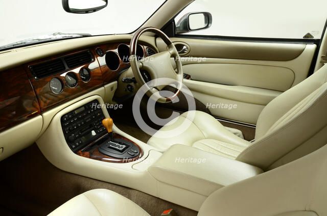 1999 Jaguar XK8 coupe Artist: Unknown.