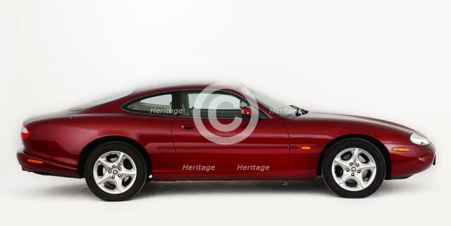 1999 Jaguar XK8 coupe Artist: Unknown.