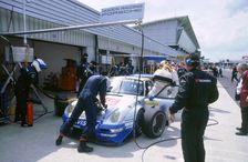 1999 Porsche 911 GT2 in pits.FIA GT Silverstone 500