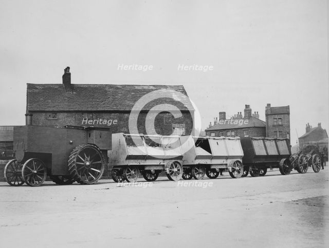 1900 Fowler armoured traction engine with munitions wagons. Creator: Unknown.