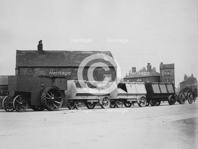 1900 Fowler F5 armoured traction engine with munitions wagons. Creator: Unknown.