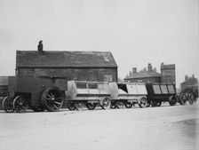1900 Fowler F5 armoured traction engine with munitions wagons. Creator: Unknown