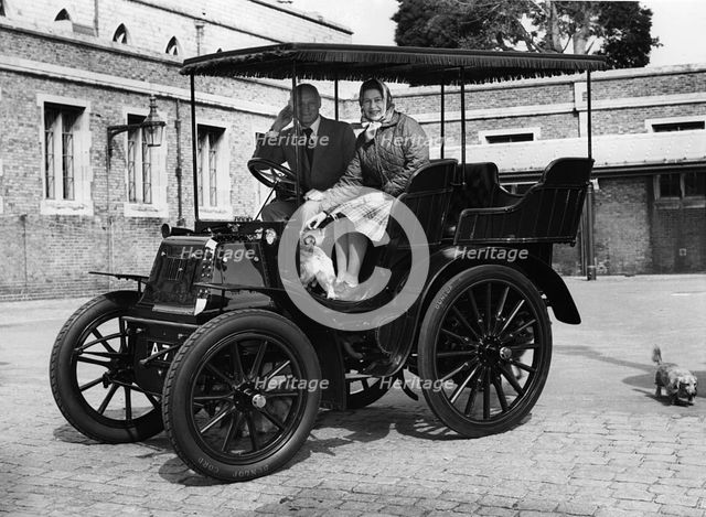 1900 Royal Daimler, with H.R.H. Queen Elizabeth with Lord Montagu in 1977. Creator: Unknown.
