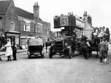 1920's Thornycroft J bus in busy street scene. Creator: Unknown