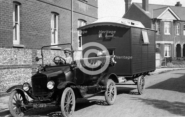 1921 Ford Model T with caravan. Creator: Unknown.