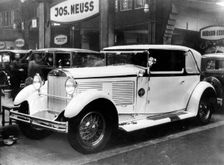 1928 Audi Imperator at motor show. Creator: Unknown