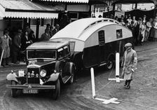 1930 Morris Oxford Six with Winchester Streamline caravan. Creator: Unknown