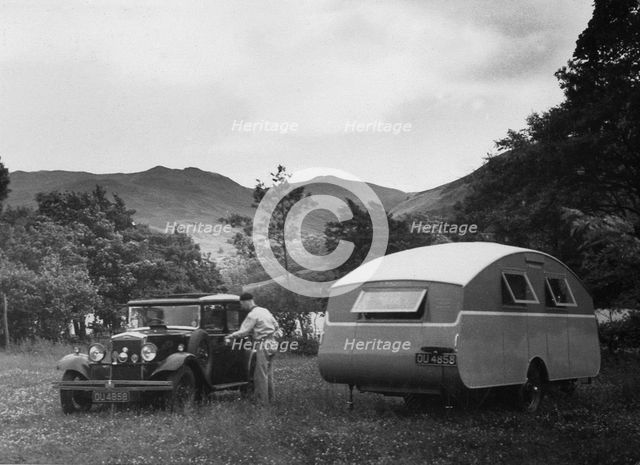 1930 Morris Oxford Six with Winchester Streamline caravan. Creator: Unknown.