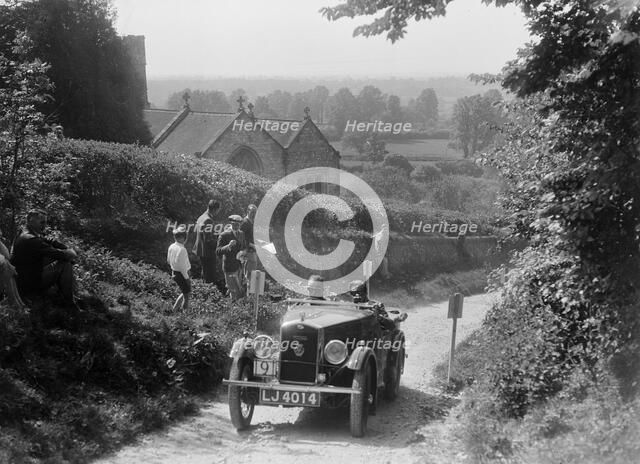 1931 Wolseley Hornet taking part in a West Hants Light Car Club Trial, Ibberton Hill, Dorset, 1930s. Artist: Bill Brunell.