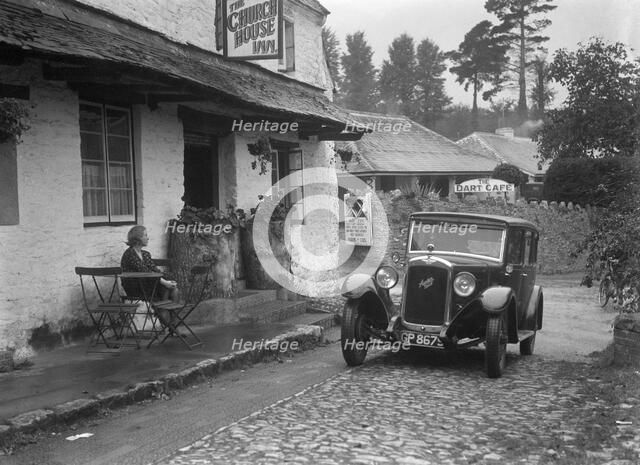 1931 Austin 16/6 on a road test, parked outside the Church House Inn, Stoke Gabriel, Devon. Artist: Bill Brunell.