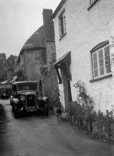 1931 Austin 16/6 on a road test. Artist: Bill Brunell