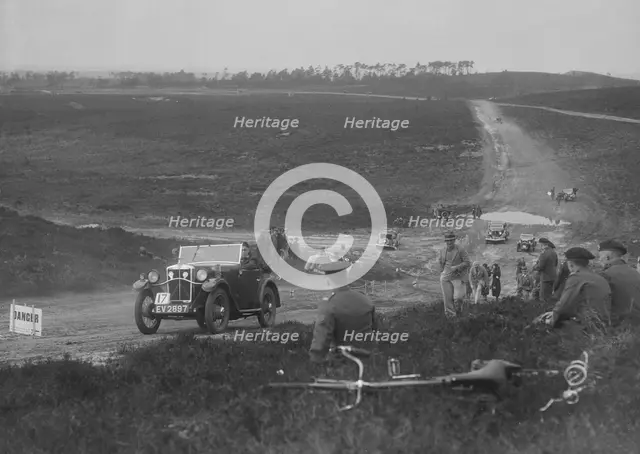 1931 Morris Minor open 2-seater competing in a motoring trial, Bagshot Heath, Surrey, 1930s. Artist: Bill Brunell.