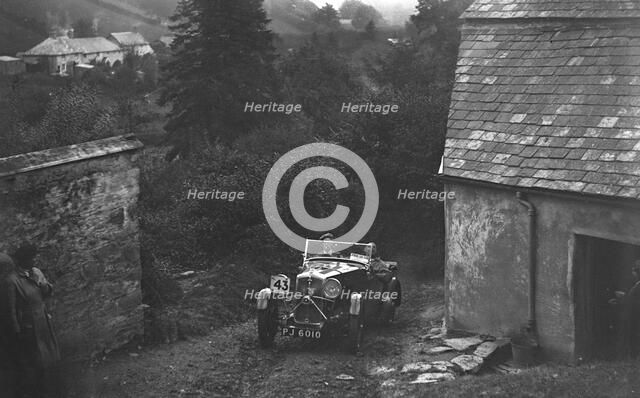 1932 Wolseley Hornet of N Tracey competing in the JCC Lynton Trial, 1932. Artist: Bill Brunell.