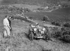 1932 Frazer-Nash TT replica taking part in the NWLMC Lawrence Cup Trial, 1937. Artist: Bill Brunell