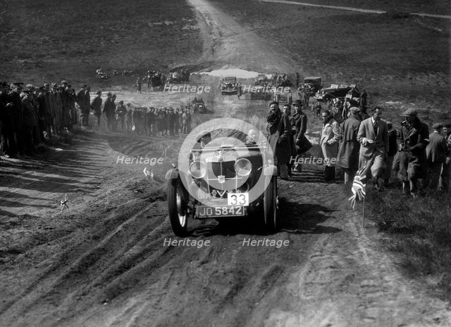 1932 MG J2 competing in a motoring trial, Bagshot Heath, Surrey, 1930s. Artist: Bill Brunell.