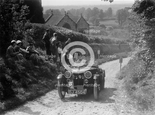 1932 MG J2 Standard taking part in a West Hants Light Car Club Trial, Ibberton Hill, Dorset, 1930s. Artist: Bill Brunell.