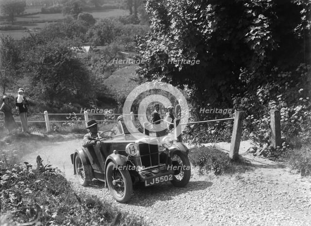 1932 MG M type taking part in a West Hants Light Car Club Trial, Ibberton Hill, Dorset, 1930s. Artist: Bill Brunell.