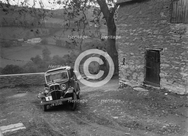 1932 Standard Little Nine taking part in a Standard Car Owners Club trial. Artist: Bill Brunell.