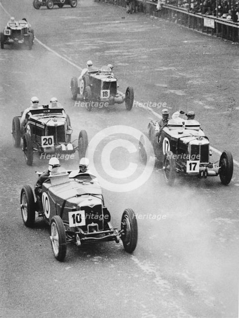 1933 Ulster TT, MG Magnette K3 Nuvolari, car number 17, trails Riley Artist: Unknown.