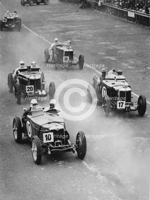 1933 Ulster TT, MG Magnette K3 Nuvolari, car number 17, trails Riley Artist: Unknown.