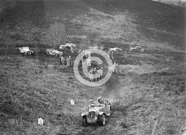 1933 Wolseley Hornet 2-seater sports taking part in a motoring trial, late 1930s. Artist: Bill Brunell.