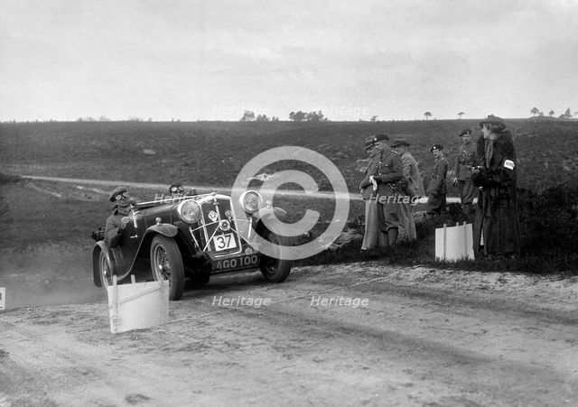 1933 Wolseley Hornet Special competing in a motoring trial, Bagshot Heath, Surrey, 1930s. Artist: Bill Brunell.