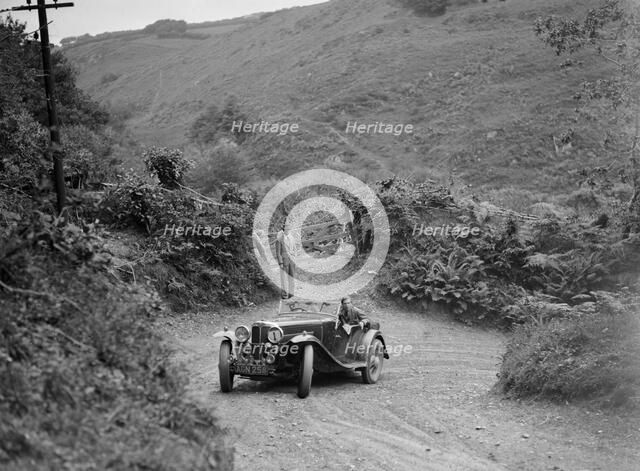 1933 AC 4-seater taking part in a motoring trial, late 1930s. Artist: Bill Brunell.