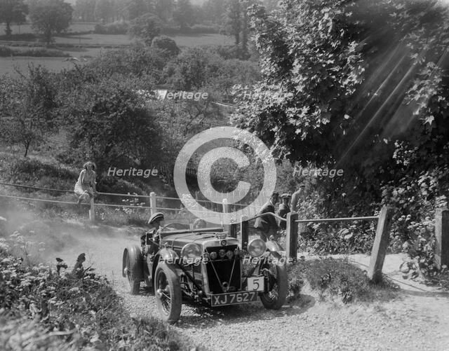 1933 Crossley Ten taking part in a West Hants Light Car Club Trial, Ibberton Hill, Dorset, 1930s. Artist: Bill Brunell.
