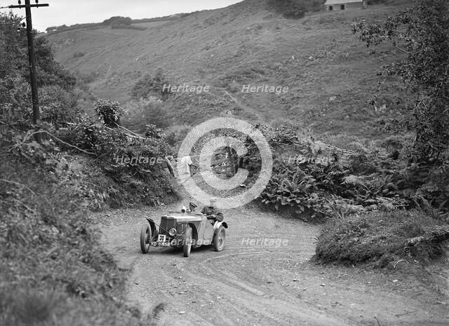 1933 MG J2 taking part in a motoring trial, late 1930s. Artist: Bill Brunell.