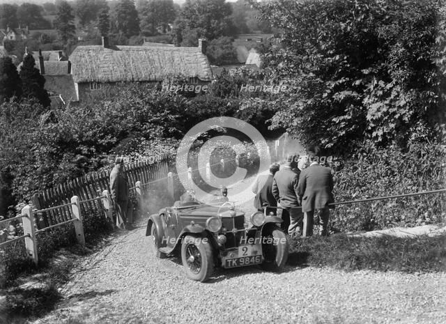 1933 MG J2 taking part in a West Hants Light Car Club Trial, Ibberton Hill, Dorset, 1930s. Artist: Bill Brunell.