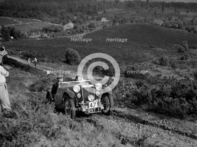 1933 MG J2 team taking part in the NWLMC Lawrence Cup Trial, 1937. Artist: Bill Brunell.