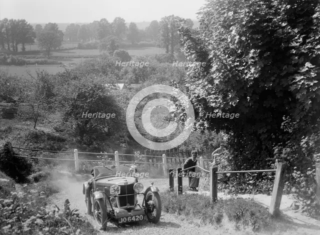 1933 MG J2 Standard taking part in a West Hants Light Car Club Trial, Ibberton Hill, Dorset, 1930s. Artist: Bill Brunell.
