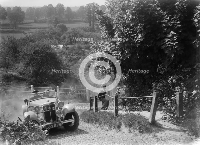 1933 Standard Avon taking part in a West Hants Light Car Club Trial, Ibberton Hill, Dorset, 1930s. Artist: Bill Brunell.