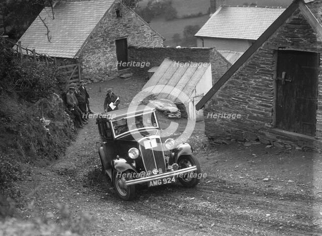 1933 Standard saloon taking part in a Standard Car Owners Club trial. Artist: Bill Brunell.