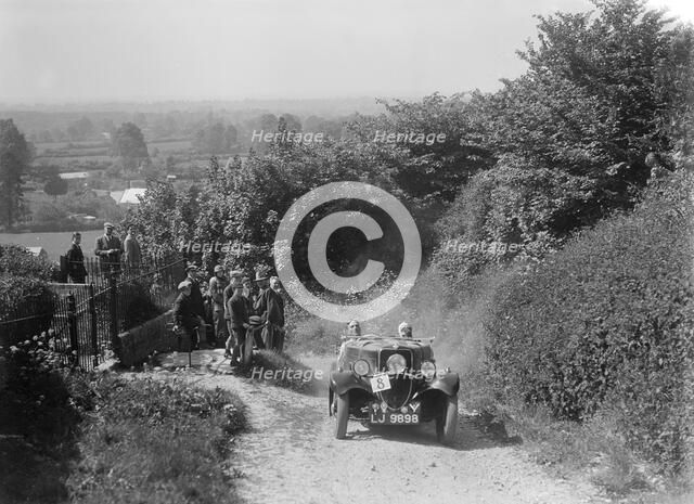 1934 Ford open 2-seater type taking part in a West Hants Light Car Club Trial, 1930s. Artist: Bill Brunell.