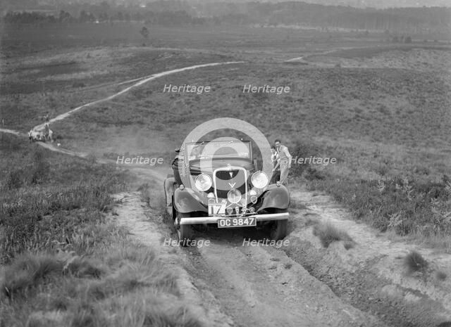 1934 Ford V8 open 2-seater taking part in the NWLMC Lawrence Cup Trial, 1937. Artist: Bill Brunell.