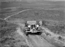 1934 Ford V8 open 2-seater taking part in the NWLMC Lawrence Cup Trial, 1937. Artist: Bill Brunell