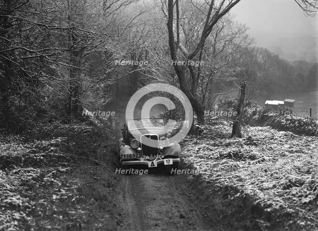 1934 Ford V8 tourer taking part in a motoring trial, late 1930s. Artist: Bill Brunell.