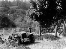 1934 MG Magnette taking part in a West Hants Light Car Club Trial, Ibberton Hill, Dorset, 1930s. Artist: Bill Brunell