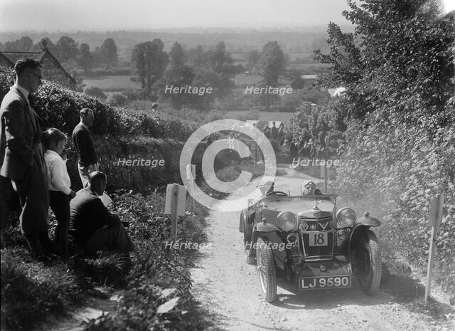 1934 MG PA taking part in a West Hants Light Car Club Trial, Ibberton Hill, Dorset, 1930s. Artist: Bill Brunell.
