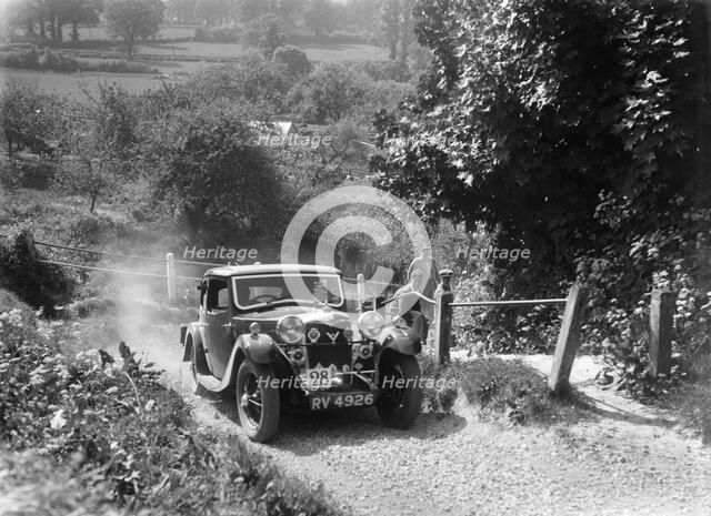 1934 Riley Kestrel taking part in a West Hants Light Car Club Trial, Ibberton Hill, Dorset, 1930s. Artist: Bill Brunell.