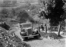 1934 Singer saloon taking part in a West Hants Light Car Club Trial, Ibberton Hill, Dorset, 1930s. Artist: Bill Brunell