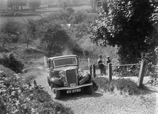 1934 Singer saloon taking part in a West Hants Light Car Club Trial, Ibberton Hill, Dorset, 1930s. Artist: Bill Brunell