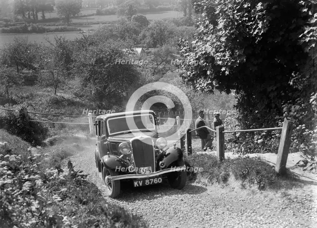 1934 Singer saloon taking part in a West Hants Light Car Club Trial, Ibberton Hill, Dorset, 1930s. Artist: Bill Brunell.