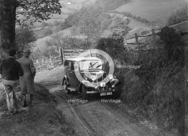1934 Standard Ten taking part in a Standard Car Owners Club trial. Artist: Bill Brunell.