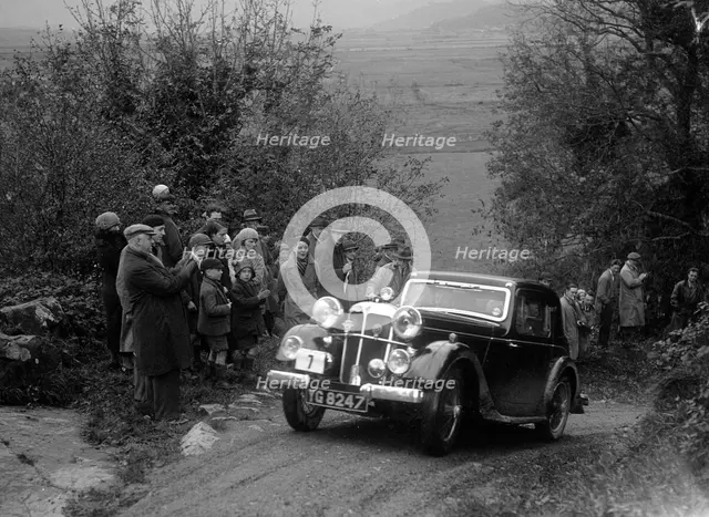 1934 Standard Avon Ten coupe taking part in a Standard Car Owners Club trial. Artist: Bill Brunell.