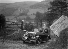 1934 Standard Avon Ten coupe taking part in a Standard Car Owners Club trial. Artist: Bill Brunell