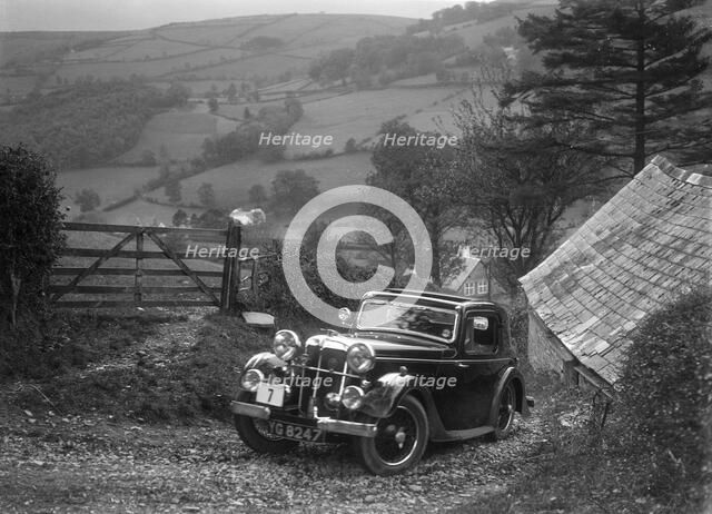 1934 Standard Avon Ten coupe taking part in a Standard Car Owners Club trial. Artist: Bill Brunell.
