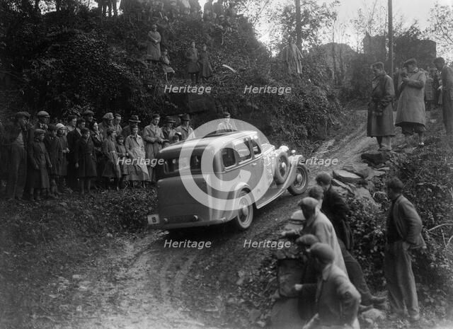 1934 Standard Sixteen taking part in a Standard Car Owners Club trial. Artist: Bill Brunell.