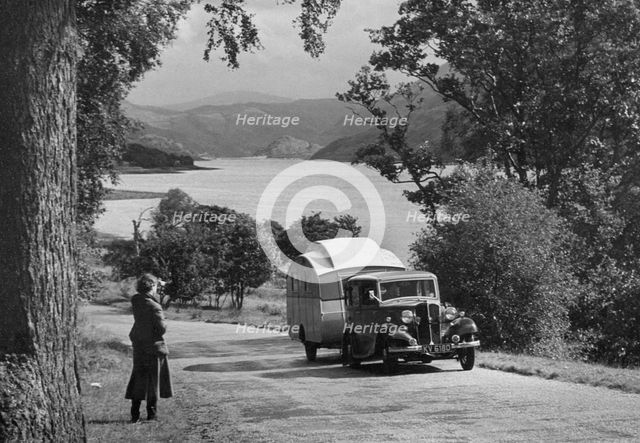 1934 Standard Sixteen with caravan. Creator: Unknown.